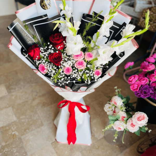 Red, Pink Roses and White Gladiolus Bouquet