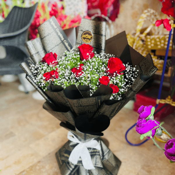 Trendy Red Roses Newspaper Bouquet