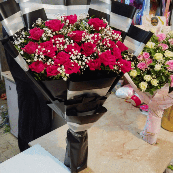 Fuchsia RosesBlack Stripe Bouquet